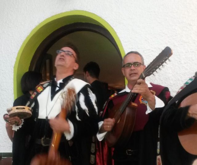 Singing Spanish men in traditional costume